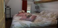 En eller flere senge i et v&aelig;relse p&aring; Au petit champignon
