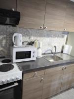 Kuchyň nebo kuchyňský kout v ubytování Georgia's apartment