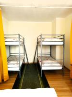 Posteľ alebo postele v izbe v ubytovaní Hostel Omega