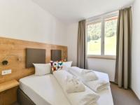 En eller flere senge i et v&aelig;relse p&aring; Majestic apartment in Kl sterle with sauna on the Arlberg Met Terras