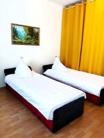 Posteľ alebo postele v izbe v ubytovaní Hostel Omega