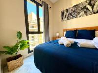 A bed or beds in a room at Premium Center Alameda
