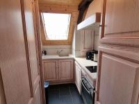 Kuchnia lub aneks kuchenny w obiekcie Chalet équipé 6 personnes avec cheminée et animaux admis - FR-1-393-159