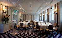a room filled with tables and chairs with white table cloth at The Gainsborough Bath Spa - Small Luxury Hotels of the World in Bath