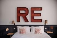 A bed or beds in a room at Soprarno Suites