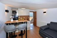 Kuchyň nebo kuchyňský kout v ubytování Apartments Radeljić