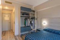 Posteľ alebo postele v izbe v ubytovaní Hotel Residence Isola Verde