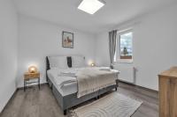 Postel nebo postele na pokoji v ubytování Hotel U Krále Jiřího