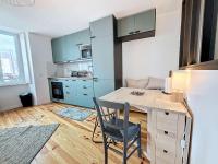 Kuchyňa alebo kuchynka v ubytovaní Appartement rénové, 1 chambre, 300m de la gare, près du centre de Granville - FR-1-361-479