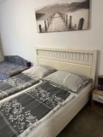 Łóżko lub łóżka w pokoju w obiekcie Penzión Vilo