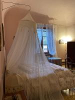 A bed or beds in a room at La Casa sul Lungarno