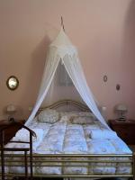 A bed or beds in a room at La Casa sul Lungarno