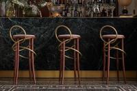 two bar stools in front of a counter at Violino d&#39;Oro Venezia in Venice