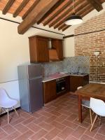 A kitchen or kitchenette at Agriturismo Diffuso Monte Oliveto Maggiore