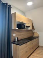 Kuchnia lub aneks kuchenny w obiekcie Apartamenty Na Rozstaju