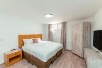 Ein Bett oder Betten in einem Zimmer der Unterkunft Villa Li Eilat