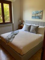 Posteľ alebo postele v izbe v ubytovaní Villa Rosina Terrazzo