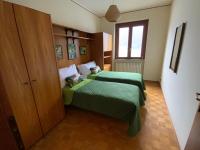 Posteľ alebo postele v izbe v ubytovaní Villa Rosina Terrazzo