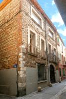 a brick building with balconies on the side of it at Lumineux T5 - Climatisation in Perpignan