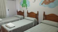 Posteľ alebo postele v izbe v ubytovaní Hotel Casa Marchena