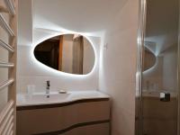 a bathroom with a sink and a mirror at Appartement Le Grand-Bornand, 3 pièces, 6 personnes - FR-1-241-61 in Le Grand-Bornand