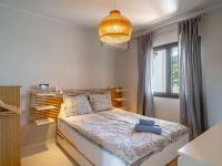 Postel nebo postele na pokoji v ubytování Holiday Home Melon by Interhome