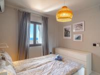 Postel nebo postele na pokoji v ubytování Holiday Home Melon by Interhome