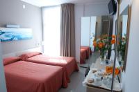 A bed or beds in a room at Hotel Villa d'Amato