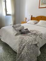 Postel nebo postele na pokoji v ubytování Apartamento con Feng Shui