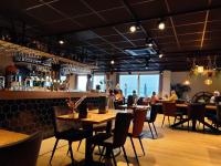 En restaurant eller et andet spisested på Vakantiepark Wulpdal