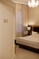 Tiffi Old Town Hotelにあるベッド