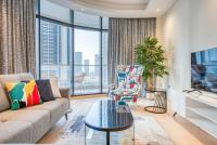 TV a/nebo společenská místnost v ubytování RH- Downtown Delight, spacious 01BR near Dubai Mall & Burj Khalifa, RP Heights