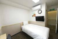 Toyoko Inn Changwonにあるテレビまたはエンターテインメントセンター