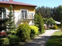 Vonkajšia záhrada v ubytovaní Hotel Pod Sosnami