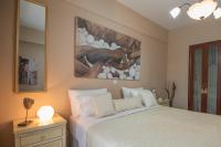 Posteľ alebo postele v izbe v ubytovaní Paradise deluxe apartment on the sea