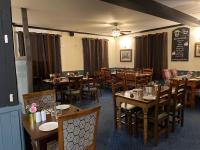 Restaurace v ubytování Leaking Well, Dunhampton