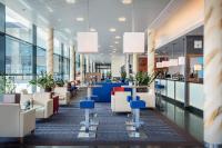 a view of a lobby with chairs and tables at Holiday Inn Express Singen, an IHG Hotel in Singen