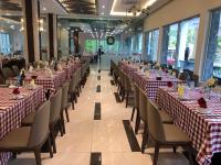 a row of tables and chairs in a banquet hall at Hanvet Hotel Do Son in Ðố Sơn