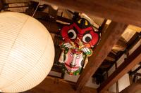 a chinese character on a sign next to a lamp at LAMP Iki in Iki