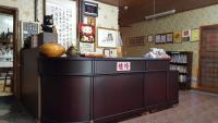 a book store with a counter with a pumpkin on it at JS Hotspring in Ruisui