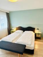 Posteľ alebo postele v izbe v ubytovaní Hotel Sonnenhof - bed & breakfast & appartements