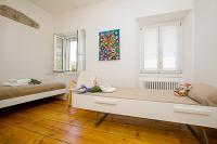 Posteľ alebo postele v izbe v ubytovaní Casa Alla Grotta - Happy Rentals