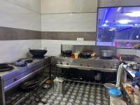 Η κουζίνα ή μικρή κουζίνα στο Green Woods Resort