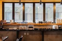 Kuchyň nebo kuchyňský kout v ubytování Malu Hotel Suwon