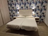 Posteľ alebo postele v izbe v ubytovaní Hotel La Duquesa