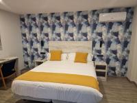 Posteľ alebo postele v izbe v ubytovaní Hotel La Duquesa