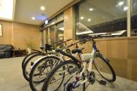 a group of bikes parked in a store lobby at Jiuning Business Hotel in Tainan