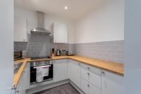 Kuchyň nebo kuchyňský kout v ubytování Cosy 1 Bedroom Apartment in Leeds