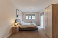 Postel nebo postele na pokoji v ubytování Spacious 2 Bed Apartment in Manchester Centre