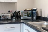 Kuchyň nebo kuchyňský kout v ubytování Lovely 1 Bed Manchester Apartment - Sleeps 3